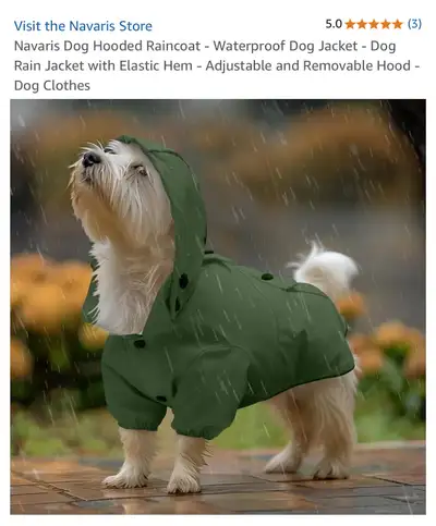 Green dog raincoat. Size XL. Features a hood and multiple buttons. Water resistant. Polyester and po...