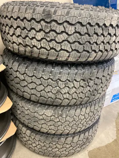 4 tires Brand new truck , drove from the dealer to a tire shop to replace for bigger ones See or Pic...