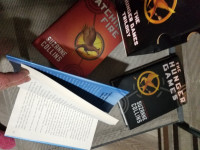 The Hunger Games  Trilogy  by Suzanne Collins  .Books