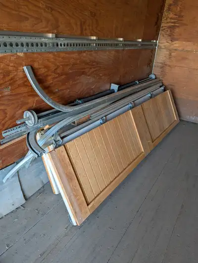 2 - WOODEN GARAGE DOORS both come with hardware * 9 ft x 8 ft * 16 ft x 8 ft Please call my Cell for...