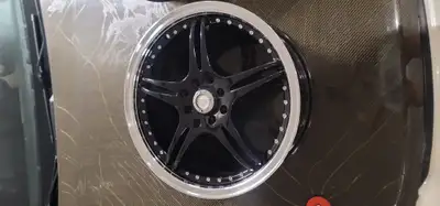 Black ADR79 17x7 aluminum alloy wheels have a machined lip finish. These rims feature a dual 4x100 a...