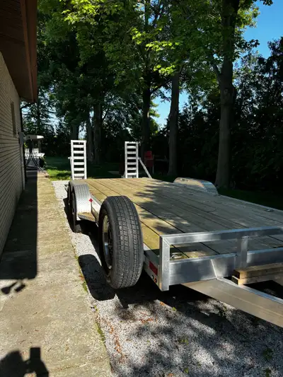 Wolverine 22ft Double Axle Aluminum Trailer Used less than 10 times. Like new. Rated for 12,000 lb p...