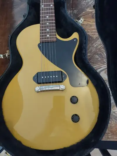 Played and loved guitar has nitro checking awesome guitar. Upgraded P-90 and pots locking strap butt...