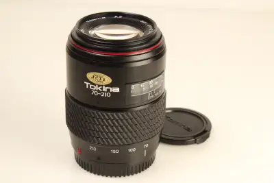 Lens is in above average to excellent condition. Glass is very clean and clear with no scratches, fu...