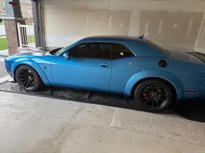 Feast your eyes on this stunning 2019 Dodge Challenger Redeye, a powerhouse of performance and style...
