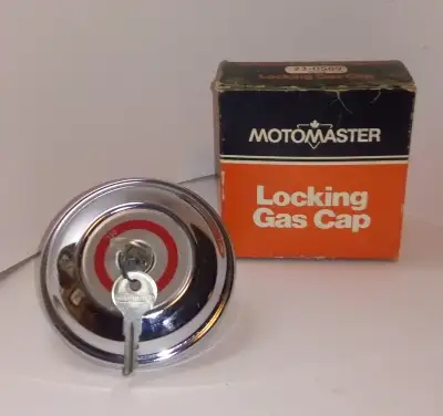 Vintage Chrome MotoMaster Locking Gas Cap. New with 2 keys. Mint condition in original box ( 1970's...