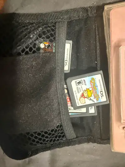 nintendo ds lite with case and 15 games, View more