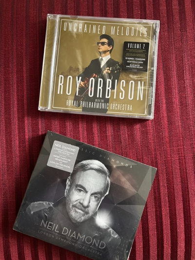 TWO BRAND NEW CDS, View more