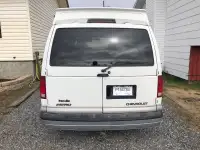Safetied  2000 Astro van Rwd with a wheel chair lift.