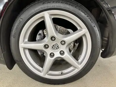 Set of 4 genuine OEM wheels and tires for 2007 Porsche 911 (997). The tires are Continental Extreme...