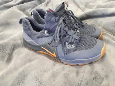 Pair of nikes size 9.5, View more