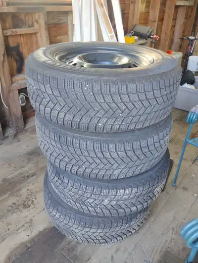 235 65 R17 Michelin winter tires on winter rims off a honda