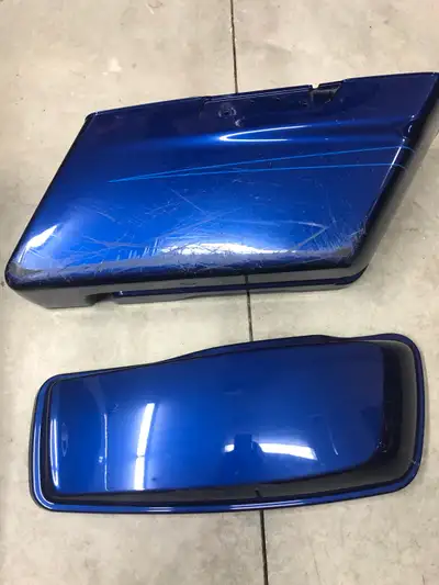 Two saddlebags from 2015 Road Glide. HD Rushmore bag style & lid latch system. Right one has road ra...