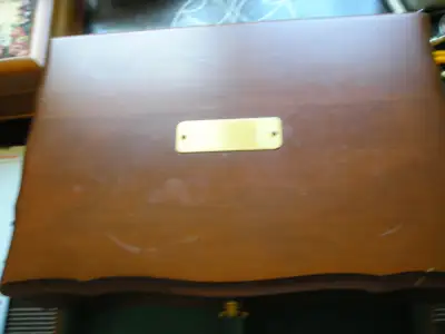 Large wooden jewelry box 2 shelves in the top .One lower drawer .