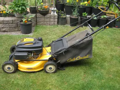 Cub Cadet 173cc. 6.75 push mower, heavy-duty walk-behind gas lawnmower equipped with powerful Kohler...