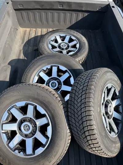 4 OEM Alloy wheels from Toyota 4Runner with Michellin X-Ice snow tires. 1 season of use.