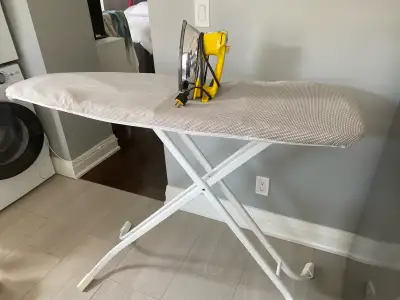 Selling delux ironing board with iron. Excellent condition $25