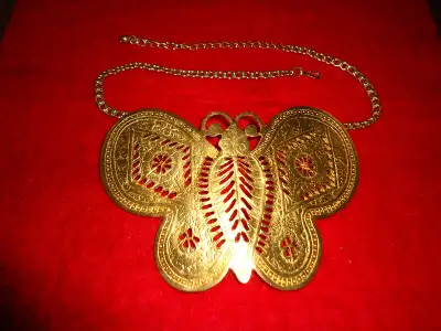Signed Kenneth Jay Lane, designer to the stars. Gold tone iconic butterfly necklace as seen on Sarah...