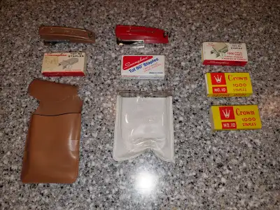 Here are two vintage Swingline Tot 50 staplers, they come with the original carrying case and severa...