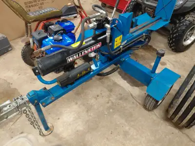 Wallenstein 20 ton wood splitter works great. Partial trade on a ferris zero turn.