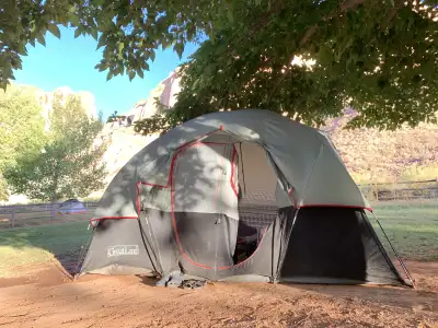 8-Person 2-Room Tent with inner pockets. Includes poles & canopy - all in good condition. $100 for e...