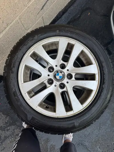 These are winter tires mounted on OEM BMW rims, offering great traction and handling in snowy condit...