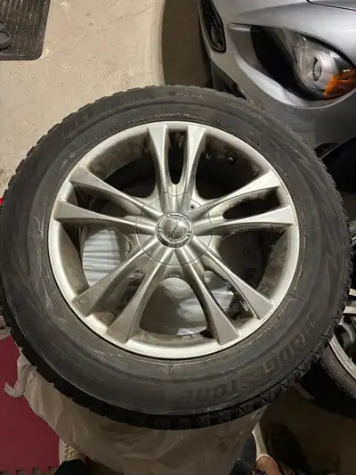 Winter wheel and tire set, tires in good condition with lots of life left. Should fit most japanese...