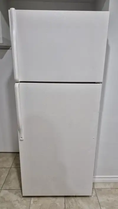 White Refrigerator & Electric Stove in Good Working Condition!, View more