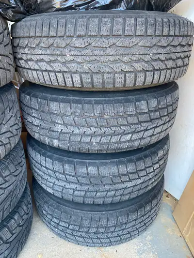 Set of 4 snow tires on Rims off a 2009 Chevy Colorado The tires are still in good condition but wron...
