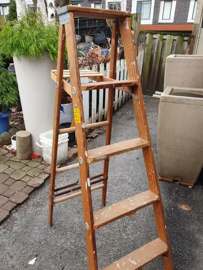 Five foot, wooden ladder is in good condition.