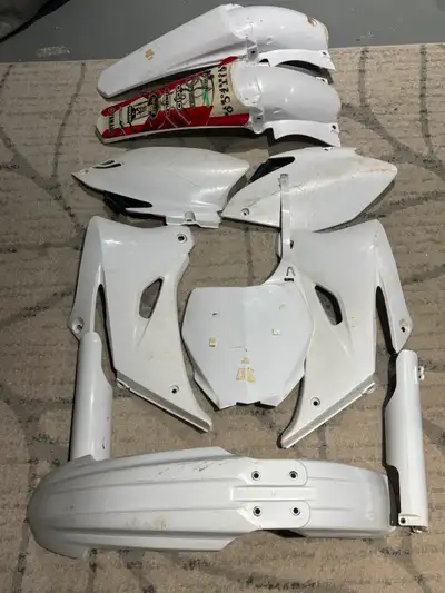 I have used YZF 250 complete plastic replacement. This year and models plastic are Interchangeable w...