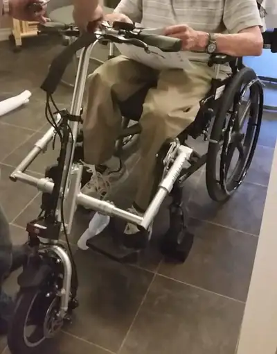 ESTATE SALE FIREFLY ELECTRIC HANDCYCLE This attaches to a wheelchair making it into a scooter(it is...