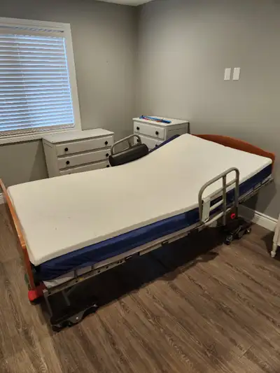 Fully adjustable electric hospital bed. Raise/lower bed height and adjust head/foot position. Comes...
