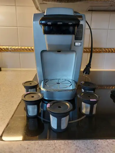 Keurig Jr. Coffee maker with coffee pod tree and coffee holders, View more