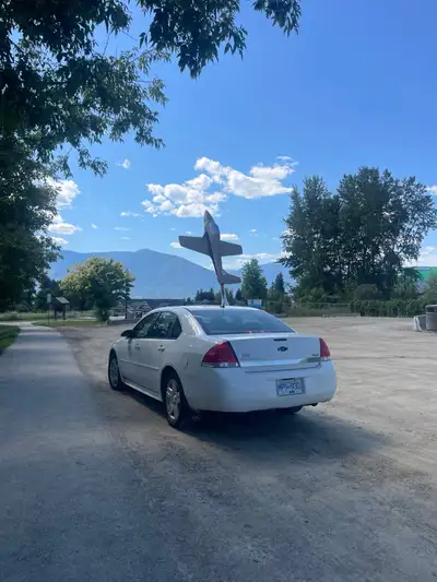 Fast, classic 2011 Chevrolet Impala - white with grey interior and all season tires. A little over 3...
