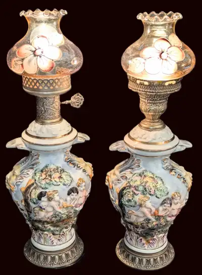 For sale is a divine Pair of Elaborate, Mid-Century Italian Capodimonte-Style Baroque Putti Art Pott...