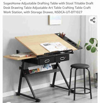 Adjustable drafting desk