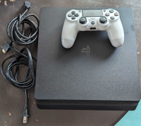 PS4 slim (with controller) and 12 games
