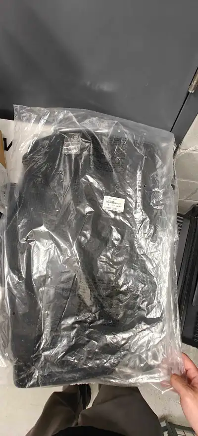 These brand new, genuine Subaru Crosstrek floor mats are sealed in their original plastic packaging.