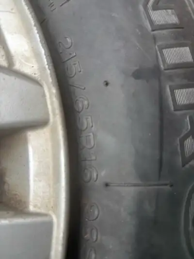 These Uniroyal 215/65R16 winter tires are in used condition, providing reliable traction for the col...