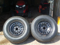 2 New Goodyear Summer Tires mounted on steel GM rims