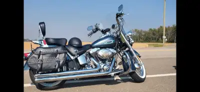 Bike has new tires and battery. Built in security system with 2 key fobs. Sound system. Lots of extr...