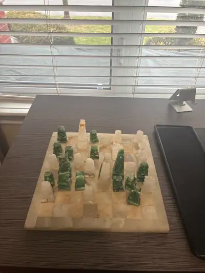 Beautiful handcrafted green and white onyx stone chess set. Even with a bit of wear, it’s a striking...