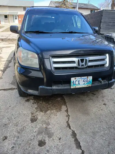 Loaded. 2006 honda pilot as is no safety 4 w d. 236.479 kms runs perfect needs some rust work and po...