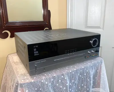 Harman Kardon's attractive AVR 135 6.1 audio/video surround receiver decodes an array of 5.1- and 6....