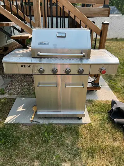 NexGrill 4 burner plus sear zone. Bought new for $1000.00. Used but decent condition