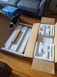 Three long boxes and packing materials