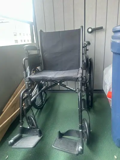 Folding wheelchair , 300lbs capacity, used once for moving after dental surgery. Stored wrapped in p...