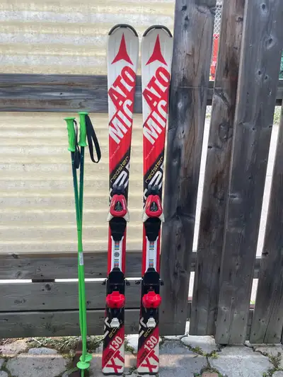 USED 130cm atomic redster skis with poles , View more
