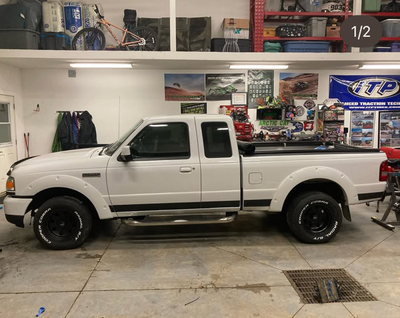2wd ford ranger cat back exhaust 15" wheels with wide tires and tinted windows v6 engine